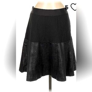 CABI  faux leather swingy skirt. Comfy elastic waist band, looks nice and sexy
